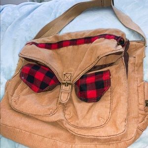 Crossbody bag with hidden inspirational quote